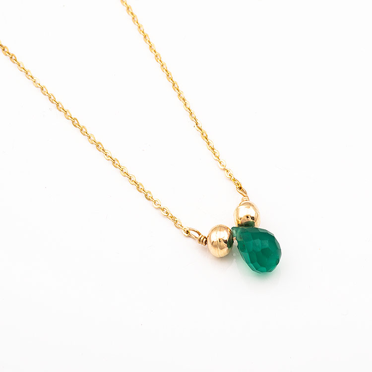 K14 gold necklace with a green teardrop-shaped stone.