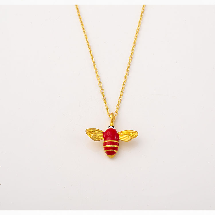 Silver, gold-plated, enamel bee necklace.
