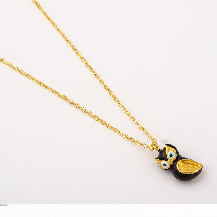 Silver, gold plated, enamel owl necklace.
