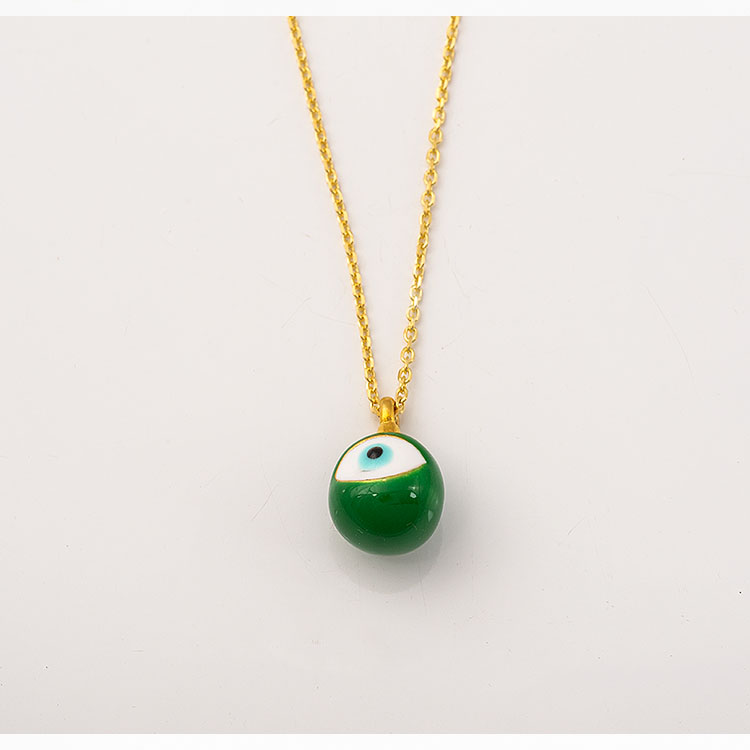 Silver gold-plated necklace with a round green enamel evil eye.