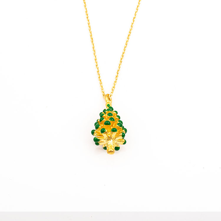 Silver gold plated necklace with a green enamel tree motif.