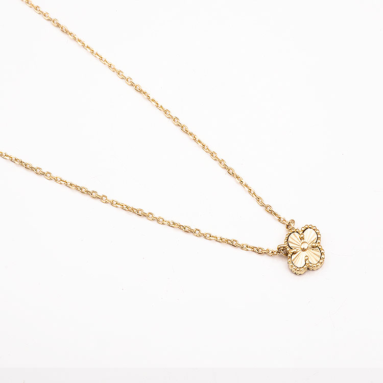 K14 gold necklace with a small cross charm
