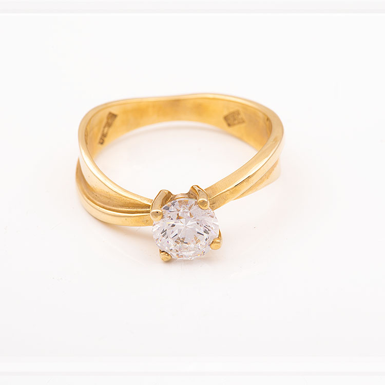 K14 gold wide band solitaire ring.