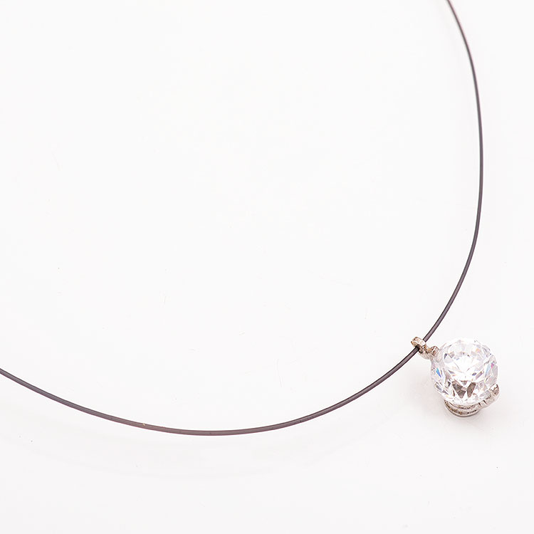 Black fishing line necklace with a K14 white gold round motif.
