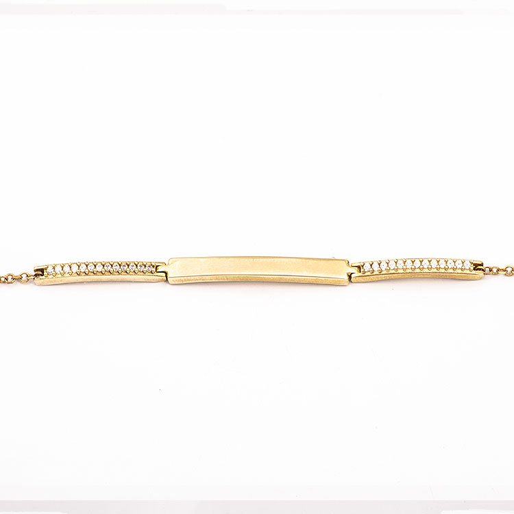 K9 gold bar bracelet with 2 bars adorned with stones.