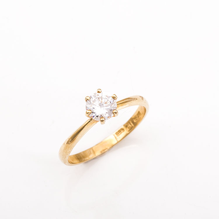 Μονόπετρο δαχτυλίδι χρυσό Κ14 με 6 δοντάκια.