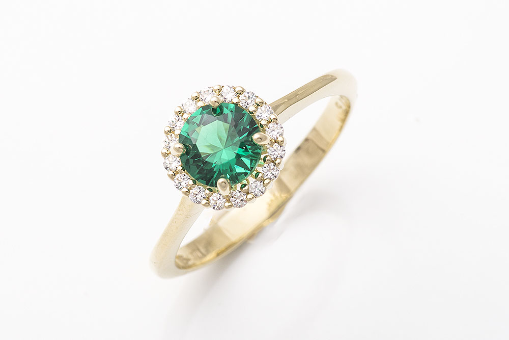 Χρυσό δαχτυλίδι Κ9, στρογγυλή ροζέτα με πράσινη πέτρα.