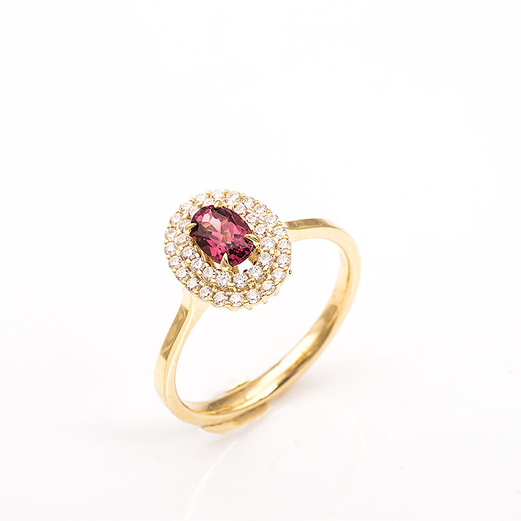 Χρυσό δαχτυλίδι Κ14 ροζέτα με πέτρα γρανάδα.