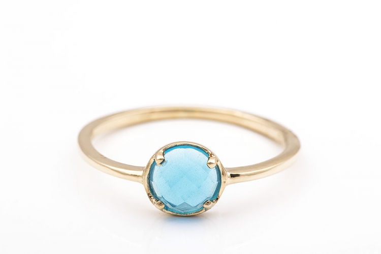 Δαχτυλίδι χρυσό Κ14 με γαλάζια πέτρα.