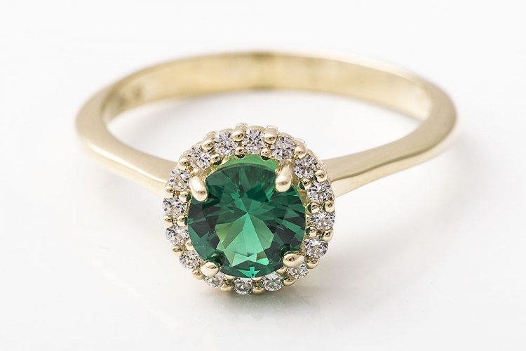 Χρυσό δαχτυλίδι Κ9, στρογγυλή ροζέτα με πράσινη πέτρα.