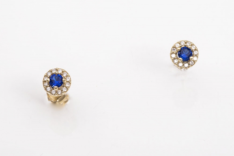 Χρυσά καρφωτά σκουλαρίκια Κ9 μικρή ροζέτα με μπλε πέτρα.