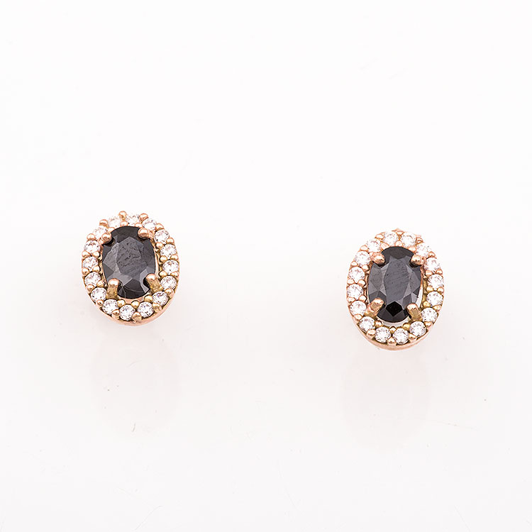 Καρφωτά σκουλαρίκια σε ροζ χρυσό Κ9 οβάλ ροζέτα με μαύρη πέτρα.